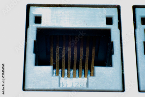 A macro photo highlighting the intricate details of an Ethernet LAN entrance, the gateway to seamless digital connectivity and data transfer photo