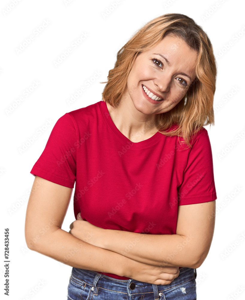 Blonde middle-aged Caucasian woman in studio laughing and having fun. Blonde middle-aged Caucasian woman in studio laughing and having fun.