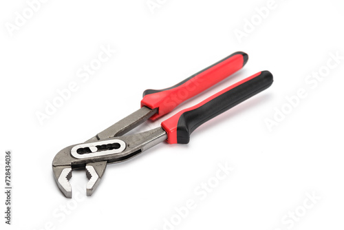 Red and black plumber pliers handle on white background.