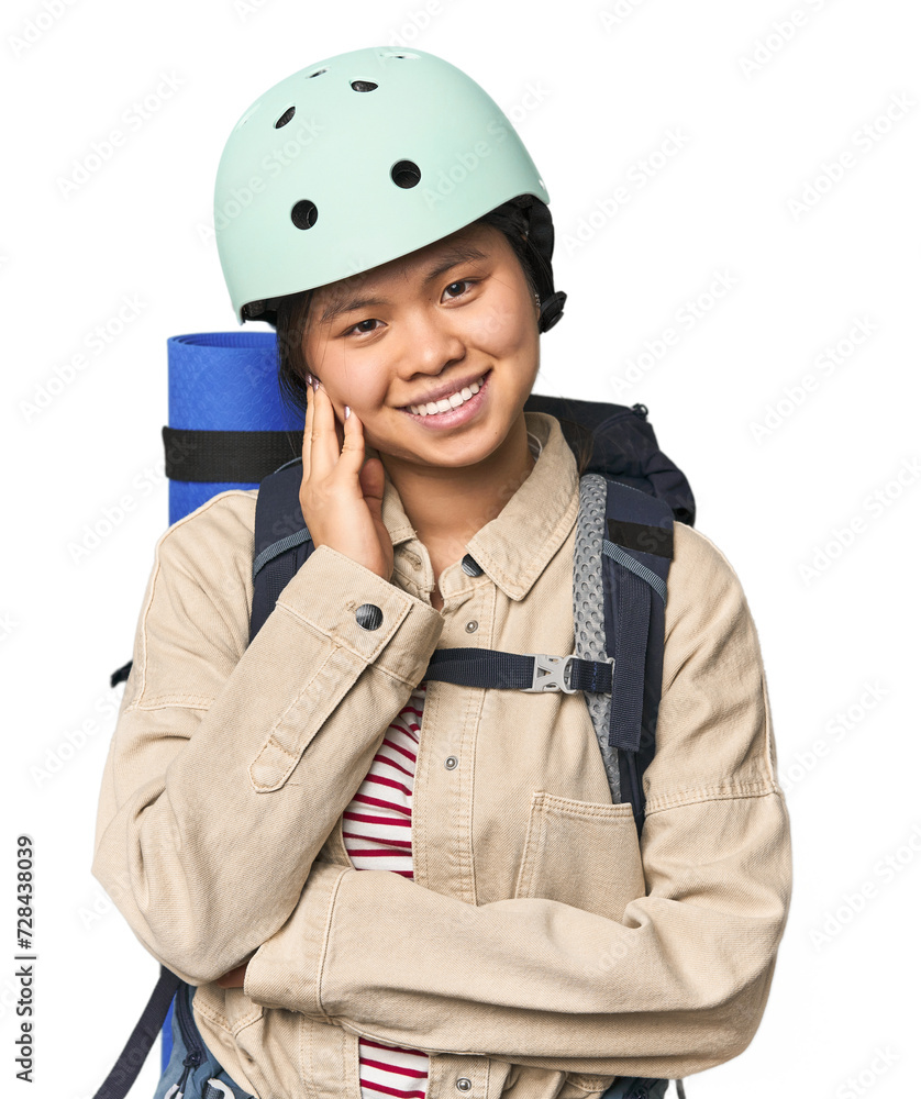 Young Chinese woman ready for hiking in studio Young Chinese woman ready for hiking in studio