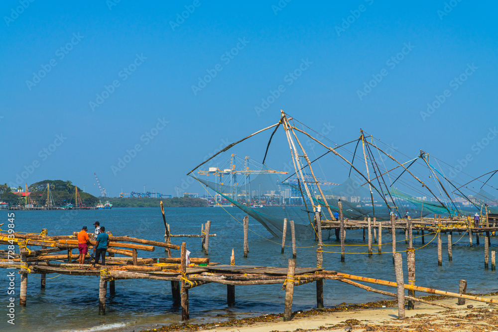 Fishermen working, Fort Kochi Kerala near Arabian Sea 