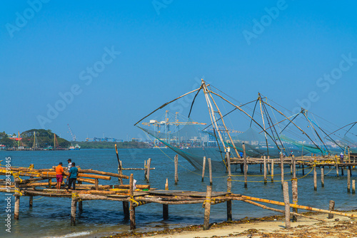 Fishermen working, Fort Kochi Kerala near Arabian Sea 