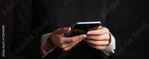 Close up photo of a woman hands using mobile smart phone