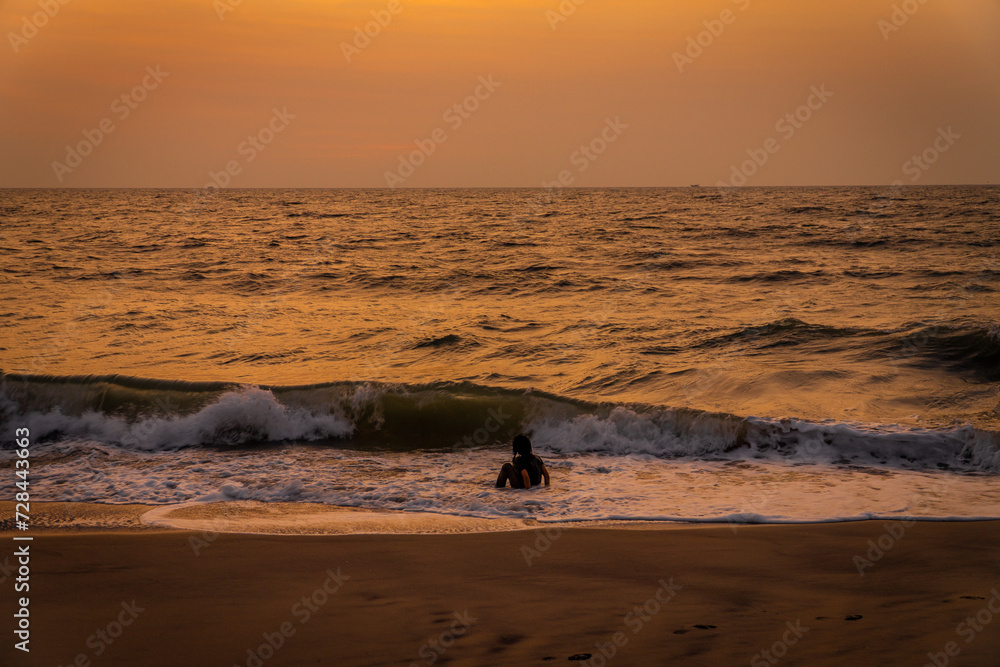 People Enjoying Sunset in Alappuzha Beach (Alleppey beach) In Kerala People Enjoying Sunset in Alappuzha Beach (Alleppey beach) In Kerala