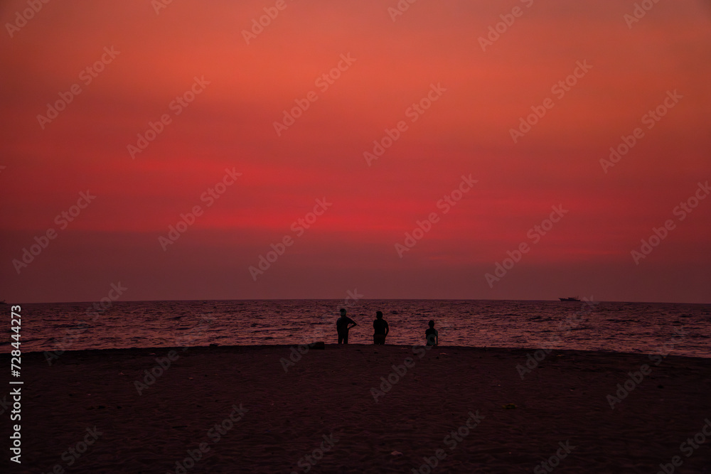 People Enjoying Sunset in Alappuzha Beach (Alleppey beach) In Kerala 
