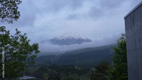 [Japan]A glimpse of Mount Fuji peeking through the gaps in the clouds. 