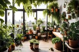Create a plant-filled oasis on the balcony with a mix of potted plants and hanging greenery 