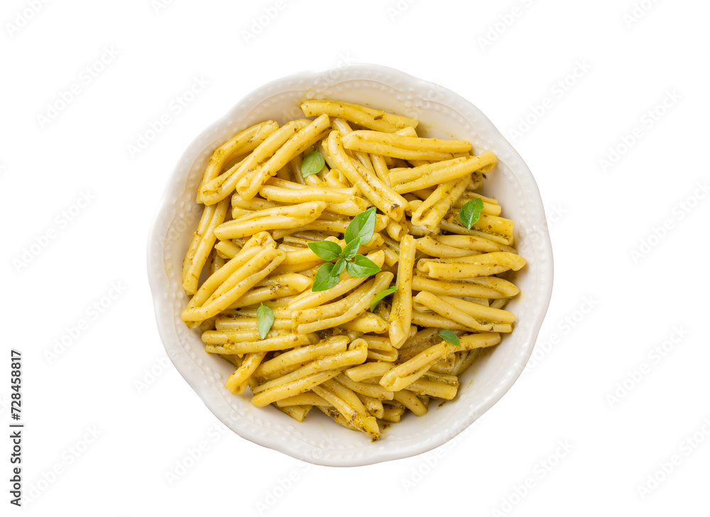 Casarecce pasta with cilantro pesto sauce on a grey background, top view. Delicious vegetarian lunch. Casarecce pasta with cilantro pesto sauce on a grey background, top view. Delicious vegetarian lunch.