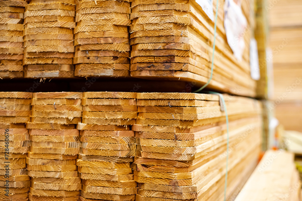 Full pallet of wooden cedar pickets with polyester strapping at hardware home improvement store in Dallas, Texas, USA, durable 1x6 pickets unfinished natural look dog ear privacy fence top Full pallet of wooden cedar pickets with polyester strapping at hardware home improvement store in Dallas, Texas, USA, durable 1x6 pickets unfinished natural look dog ear privacy fence top
