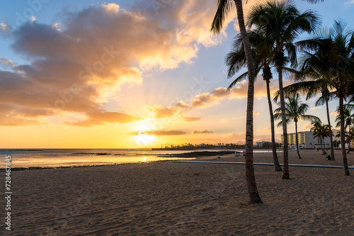 Obraz na płótnie Immerse in the tranquil beauty of Playa del Reducto, Arrecife - a golden sand oasis with calm seas, perfect for family fun and sunset strolls in Lanzarote. w salonie