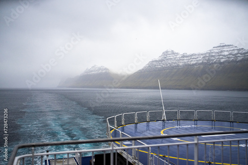 Ferry in the fjord © Wiktor