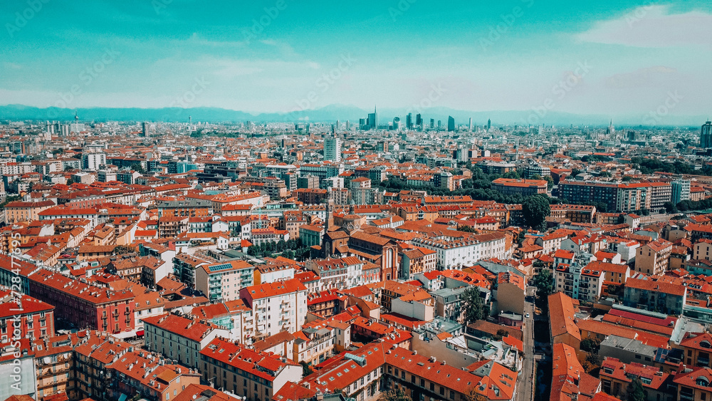 Milan city skyline aerial view. The theatrical performance shot from the Milan cityscape. Aerial footage. Milan drone footage