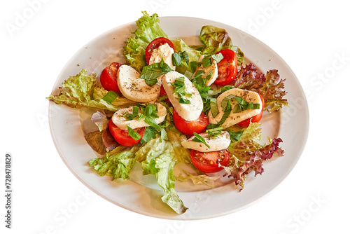 Plate with a Salade Tomates Mozzarela isolated on white