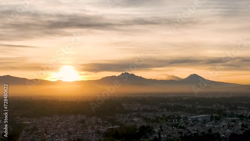 Wonderful Shot Of Distant Volcano In Iztaccihuatl At Sunrise, Mexico City photo