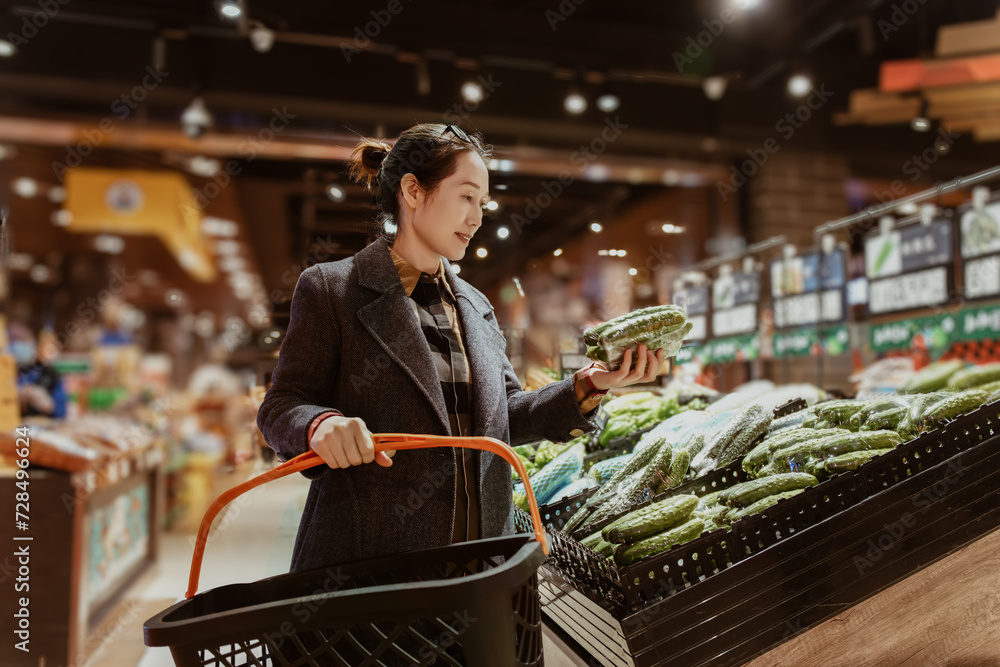 Businesswoman Choosing Fresh Produce in Supermarket Businesswoman Choosing Fresh Produce in Supermarket