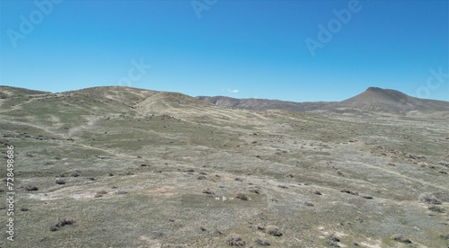 Scenic desert with hills against the background of a blue sky. Nevada, USA