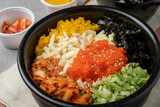 Korean food, snack, gimbap, bulgogi, rice bowl, bibimbap, stir-fried spicy pork, cheese, flying fish roe, rice cake, dumpling soup, tteokbokki, sundae, and Rabokki
