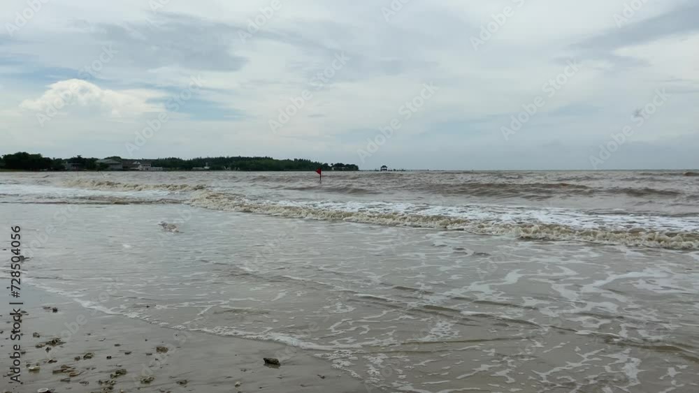 Red flags on the beach. Red flag is high hazard meaning high surf or strong currents Red flags on the beach. Red flag is high hazard meaning high surf or strong currents