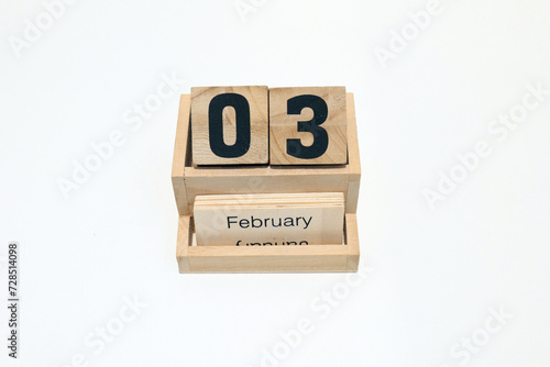 3rd of February wooden perpetual calendar. Shot close up isolated on a white background 