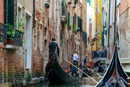 A Gondola Ride in Venice. Gondoliers On the Grand Canal. Venice Travel