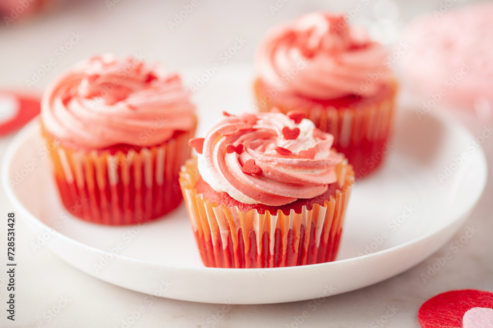 Red velvet cupcakes with whipped cream for Valentine's day