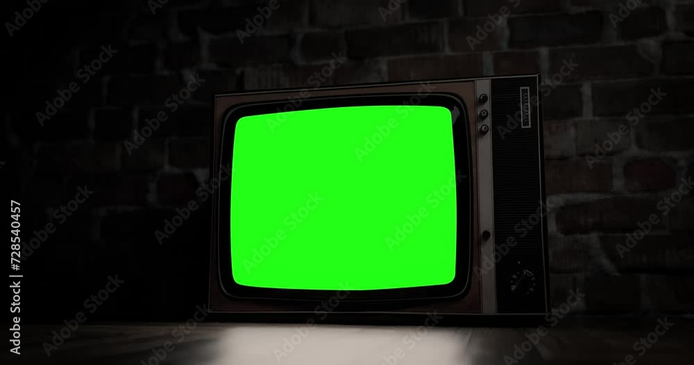 Activate vintage TV with noise, switch to green screen. Nightmarish horror ambiance, camera pans smoothly. Includes luma matte, tracking, chroma key.