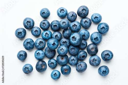 A pile of fresh blueberries on a clean white surface. Perfect for food blogs, recipes, and healthy eating articles