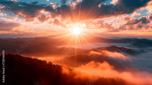 sunrise over the mountains with clouds, sunlight, mist © mr_marcom
