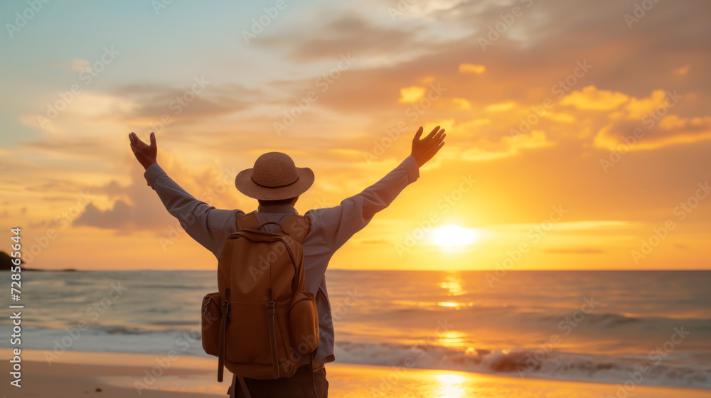 Person with arms raised at tropical beach sunset, celebrating travel and exploration.	