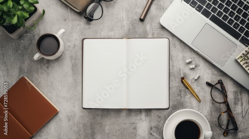 Open Notebook on Table With Coffee Cup and Laptop