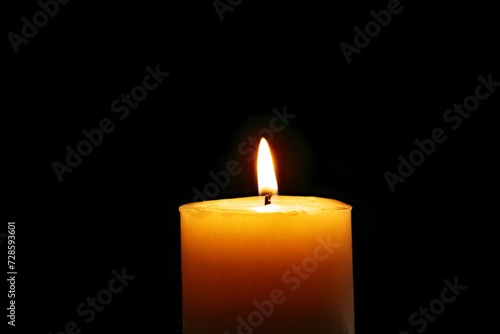 Candle burns Isolated On Black background