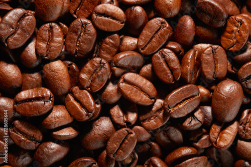 Large group of roasted Arabica coffee beans. Background. Top view.