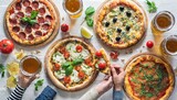 pizza party for friends or family flat lay of various pizzas drinks and people celebrating with beer over plain white table background top view fast food comfort food italian cuisine concept