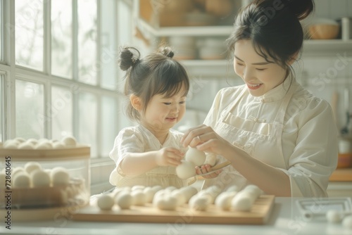 Woman and Little Girl Making Food