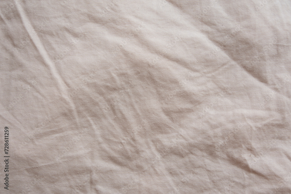 Rough Natural Beige Fabric. Textured Background of Pleated Cotton Fabric with Visible Material Weaves. Layout with Texture of Canvas. Dusty Beige Crumpled Fabric. Rough Natural Beige Fabric. Textured Background of Pleated Cotton Fabric with Visible Material Weaves. Layout with Texture of Canvas. Dusty Beige Crumpled Fabric.