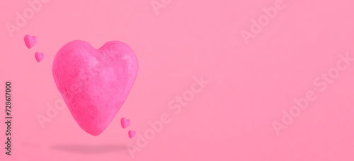 Shabby pink hearts on pastel pink background. St. Valentines day banner.