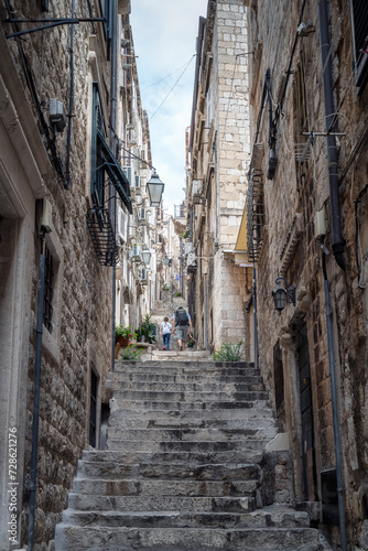 Narrow and steep alley with stone steps in the center of the old town of Dubrovnik  Croatia