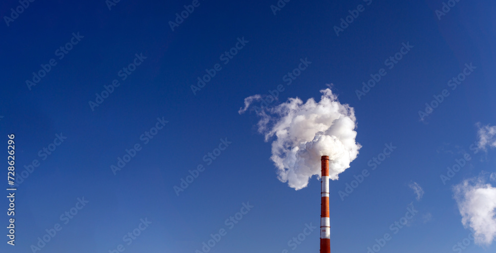 Фотография Factory pipe polluting air, smoke from chimneys