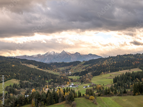 Fototapeta Naklejka Na Ścianę i Meble -  view of the mountains from another mountain in autumn	