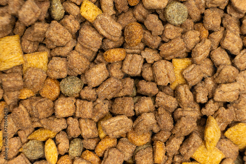 Dry food for puppies close-up. Complete diet for dogs during their first year of life