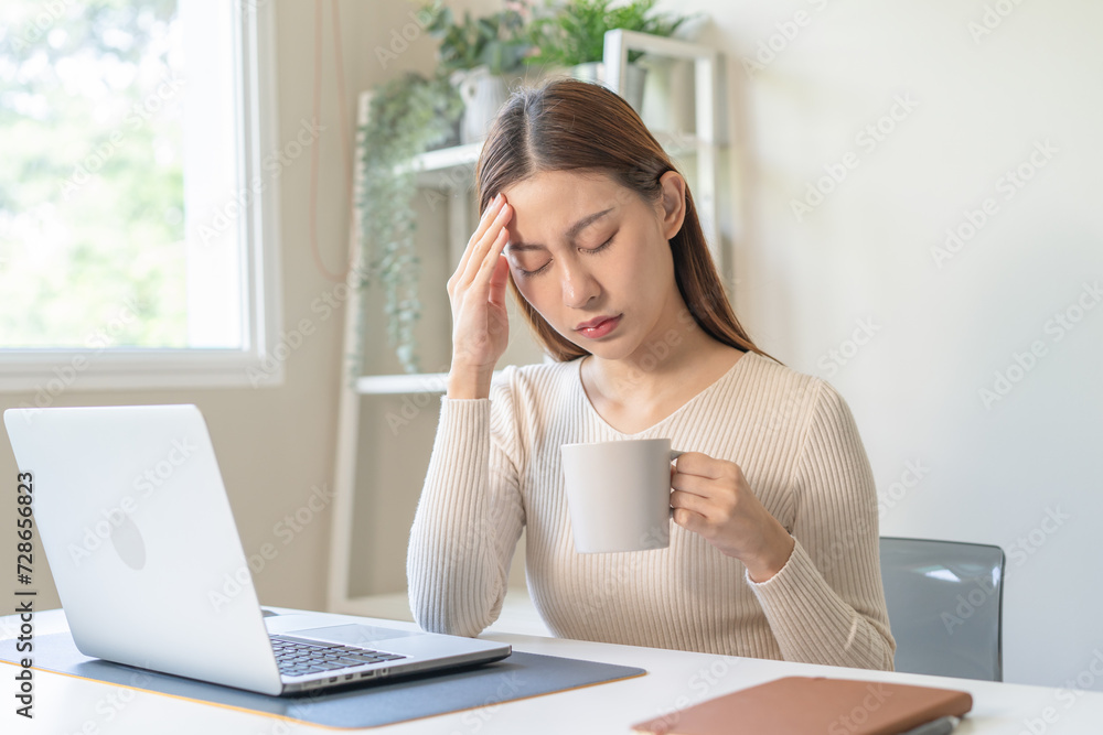 Young beauty asian woman headache when drink hot coffee Young beauty asian woman headache when drink hot coffee