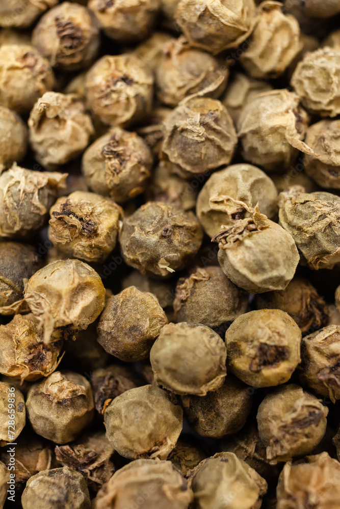 Dry green peppercorns background. Aromatic, organic spice. Top view. Dry green peppercorns background. Aromatic, organic spice. Top view.