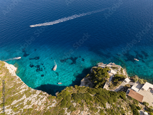Blue caves in zakynthos, Greece. Potamitis Dive Spot, Zakynthos, greece. Skinari View Point. Blue Caves located near Cape Skinnari. Aerial drone view Turquoise ionian sea in greek island.