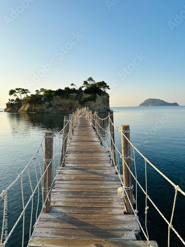 Greek island with wooden bridge. Cameo island in Greece. Sunrise on Cameo island in Greece. Cameo Wedding Island in Zakynthos, Greece.