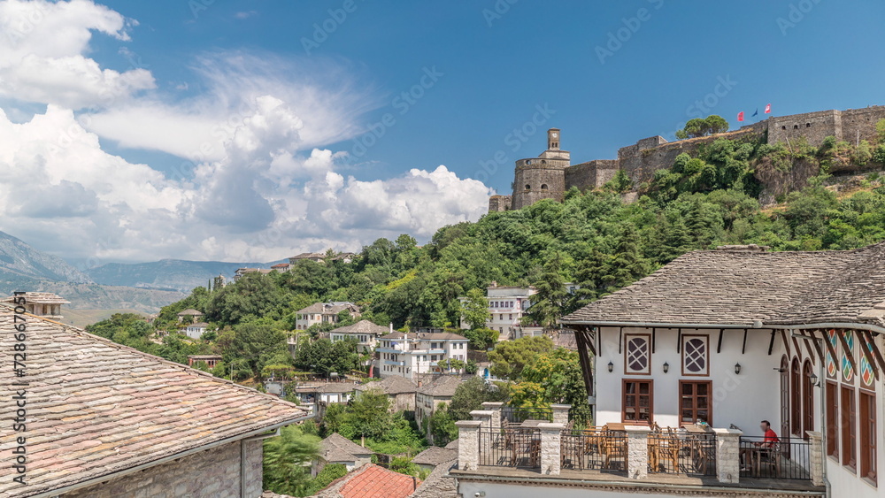 Panorama showing Gjirokastra city from the viewpoint with the fortress of the Ottoman castle of Gjirokaster timelapse.