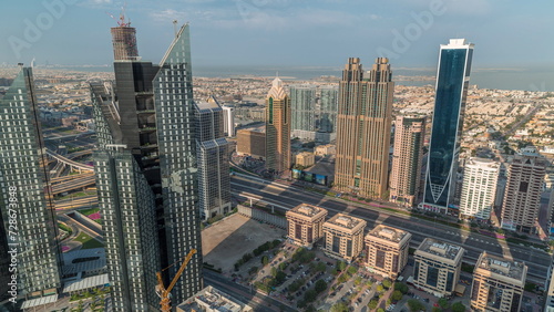 High-rise buildings on Sheikh Zayed Road in Dubai aerial morning timelapse, UAE.
