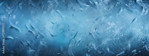 Ice texture, cracked and scratched frosted surface, abstract winter season background. Blue background 