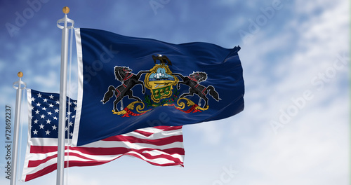 Pennsylvania state flag waving with the american flag