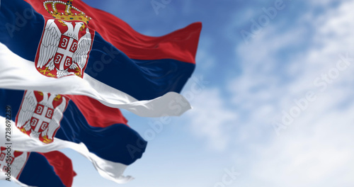 Serbia national flags waving in the wind on a clear day