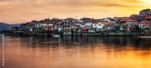 Panoramic view of the old village of Combarro in Galicia, Spain at sunset. © D.G.Eirin